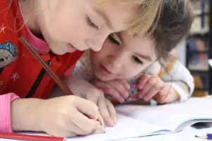 young girls doing clasroom activities